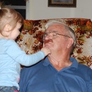 Chuck with Mr. Potato Head Mustach with Great Granddaughter Alyssa